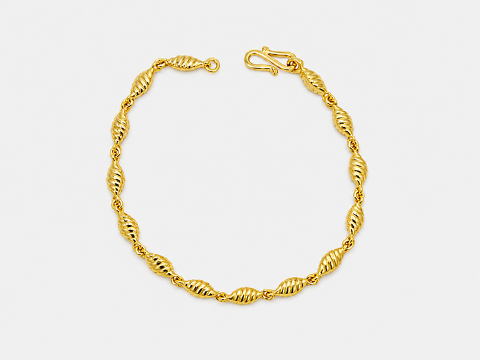 Golden Twisted Oval Bead Bracelet