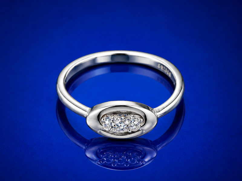 Silver Oval Bezel Three-Stone Ring