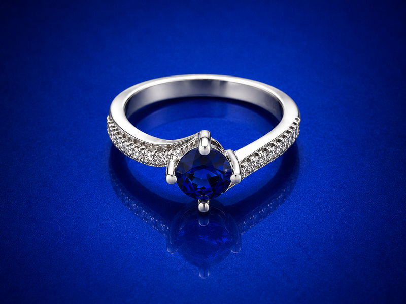 Silver Blue Round Solitaire Twist Ring