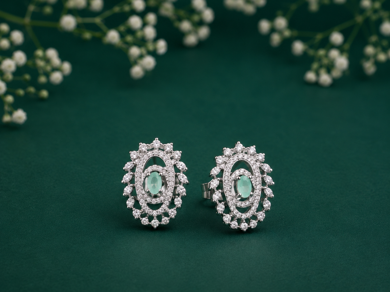 Silver Emerald Oval Double Halo Studs